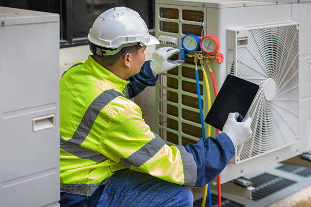 Professional Heat Pump Repair technician working in Port Royal, KY